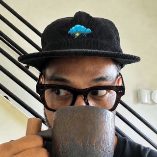 Rexx with a coffee mug